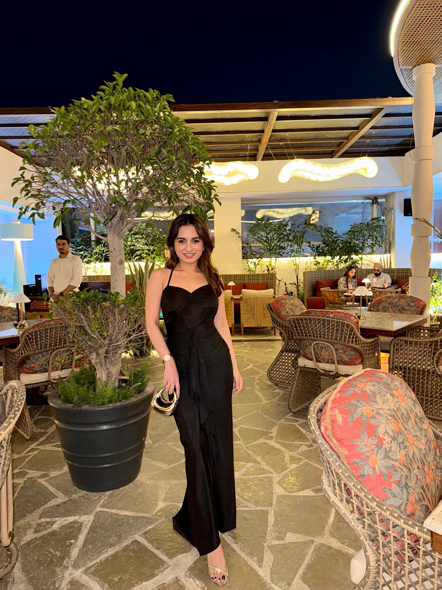 Black midi dress by Imagine By Shiwali, featuring a sleek, fitted design with a elegant neckline and midi-length hem.