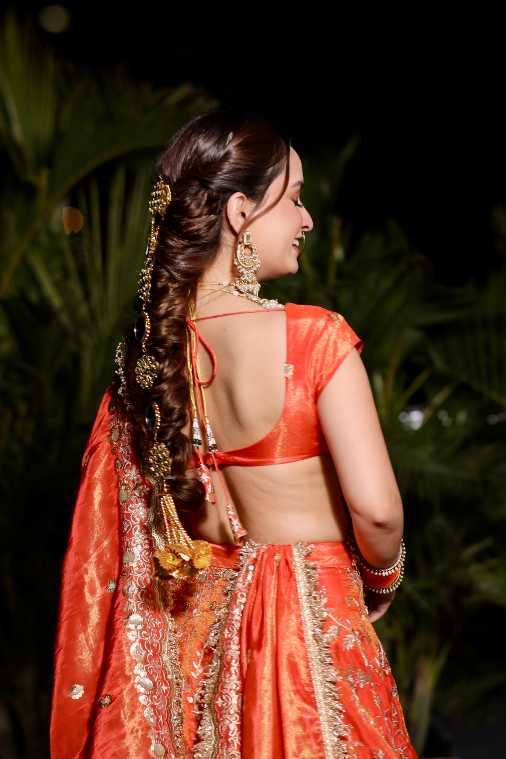About Chandani Orange Lehnga with Zari Work