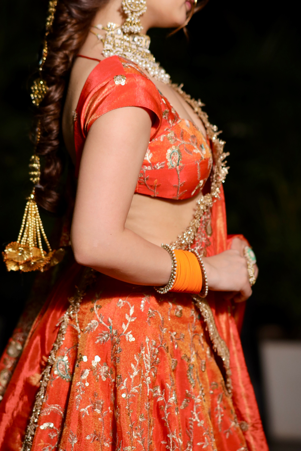 Chandani orange lehenga with intricate zari work by Imagine By Shiwali, featuring detailed embroidery and traditional design.