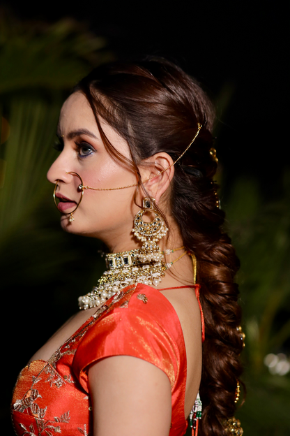 Chandani orange lehnga with intricate zari work by Imagine By Shiwali, showcasing traditional Indian bridal attire.