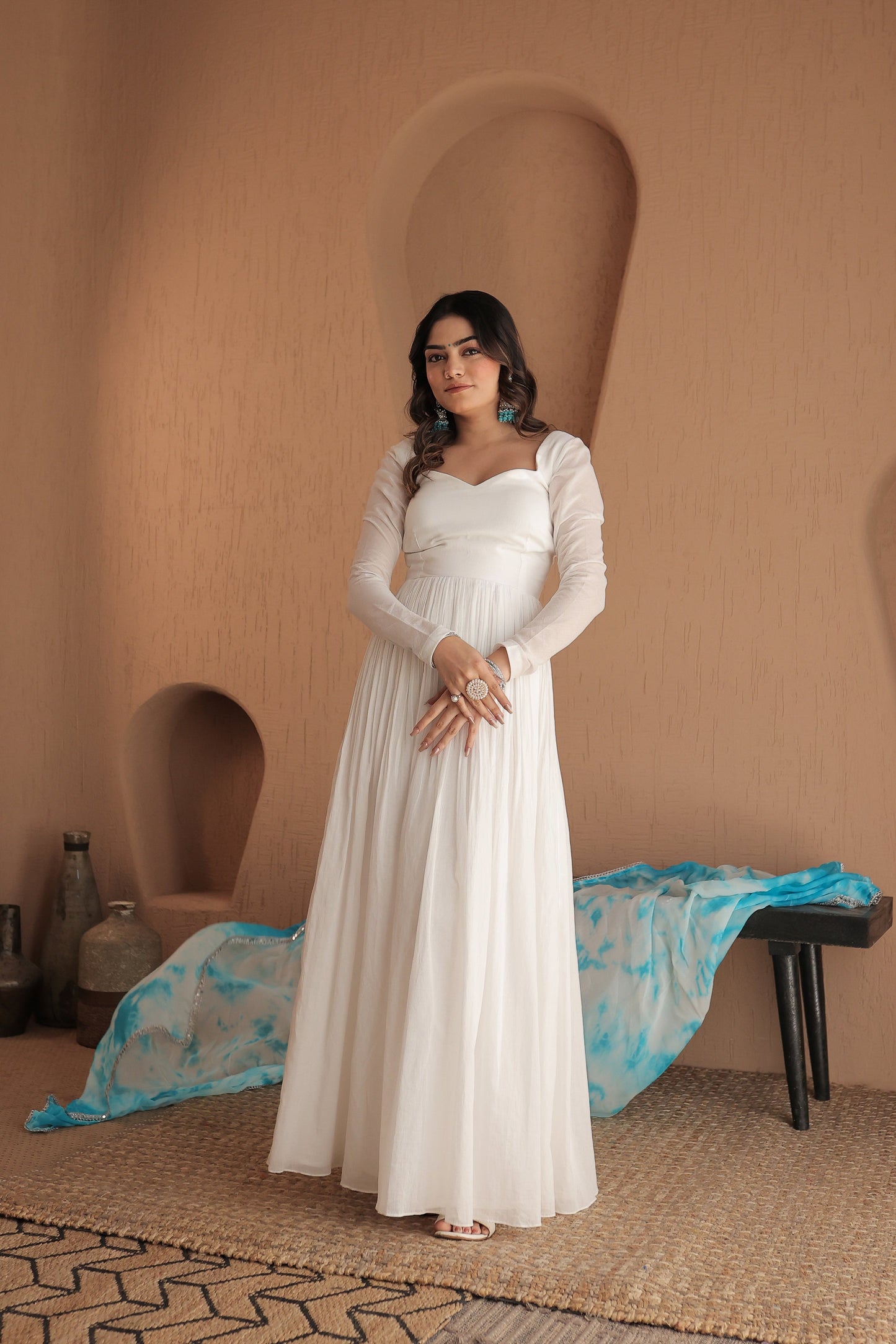Chandani white mulmul anarkali dress by Imagine By Shiwali, featuring intricate embroidery and flowing fabric.