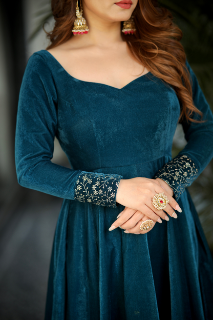 Sea green Deepika Velvet Anarkali dress by Imagine By Shiwali, featuring intricate embroidery and flowing fabric.