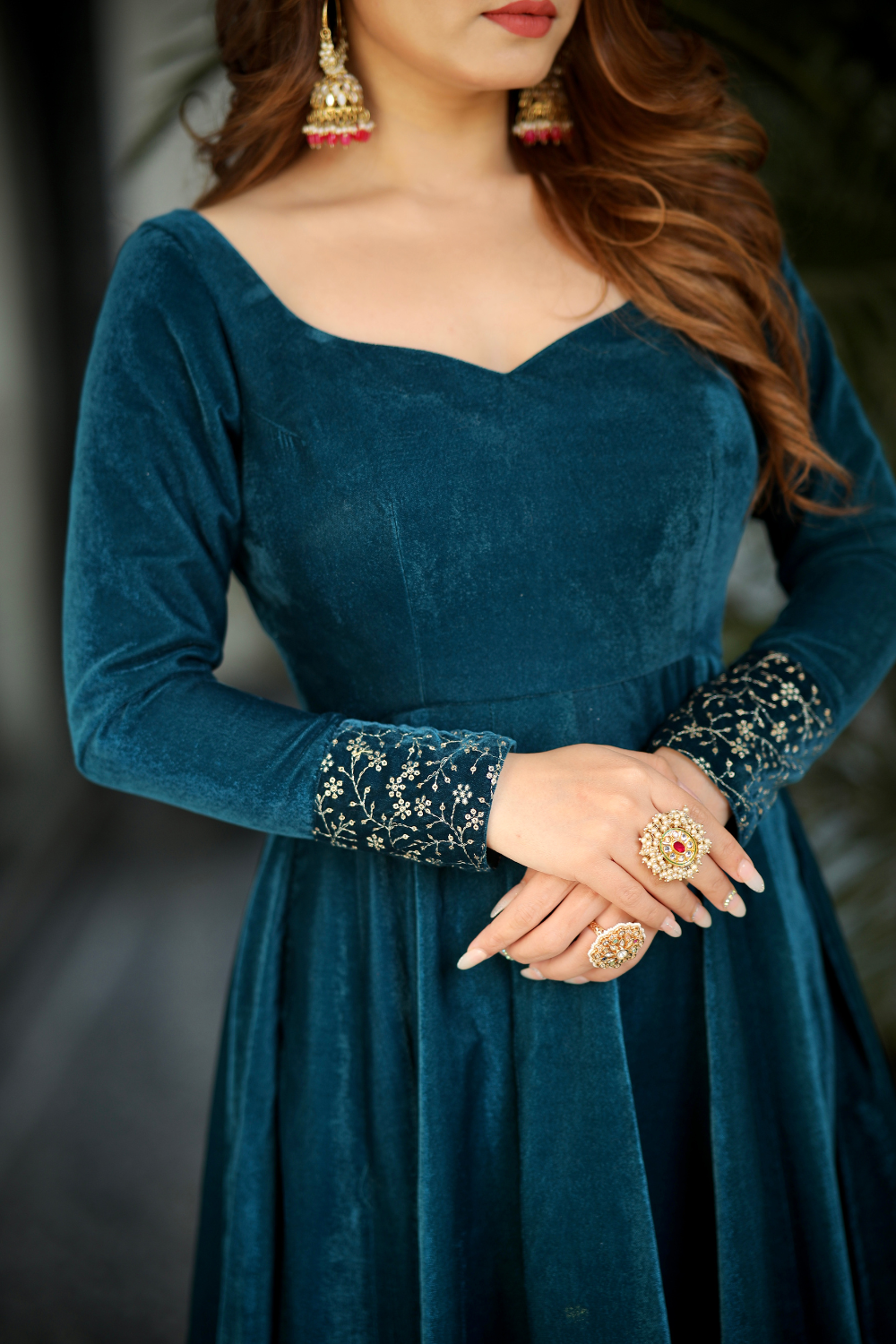 Sea green Deepika Velvet Anarkali dress by Imagine By Shiwali, featuring intricate embroidery and flowing fabric.