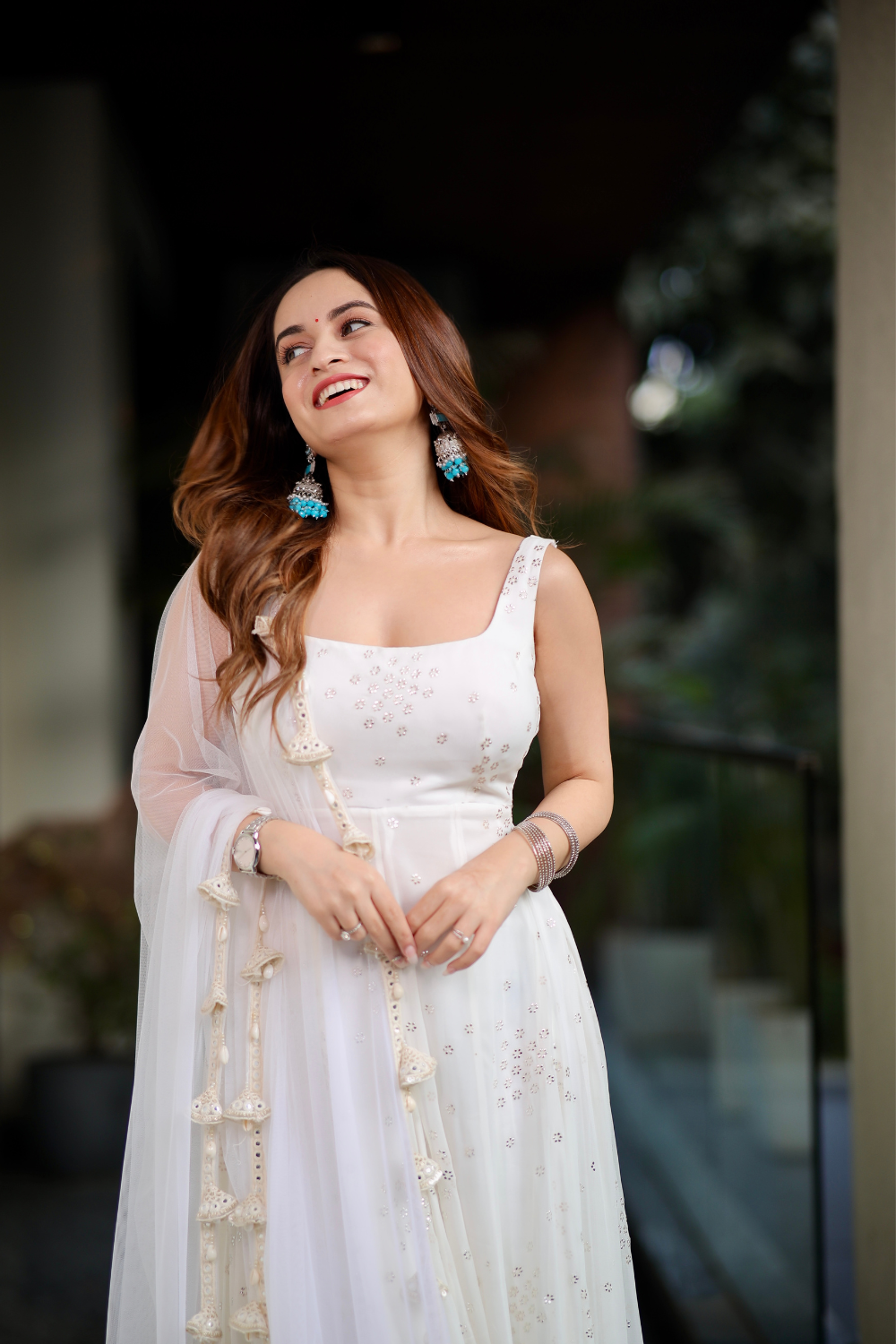 Imagine By Shiwali Dolly White Anarkali featuring intricate embroidery and flowing fabric, perfect for traditional celebrations.