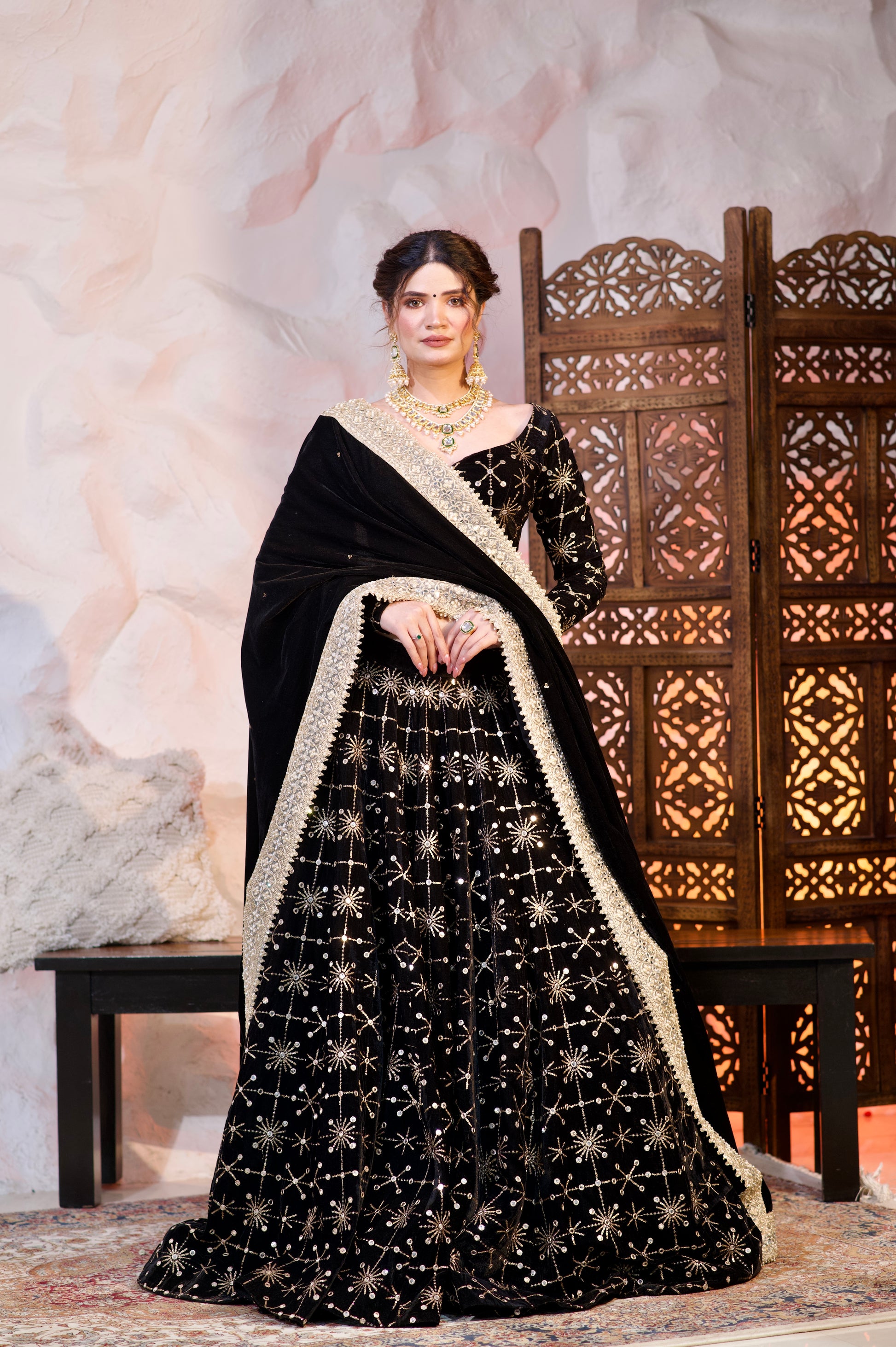 Black velvet Lehnga dress by Imagine By Shiwali featuring intricate traditional embroidery and a flowing silhouette.