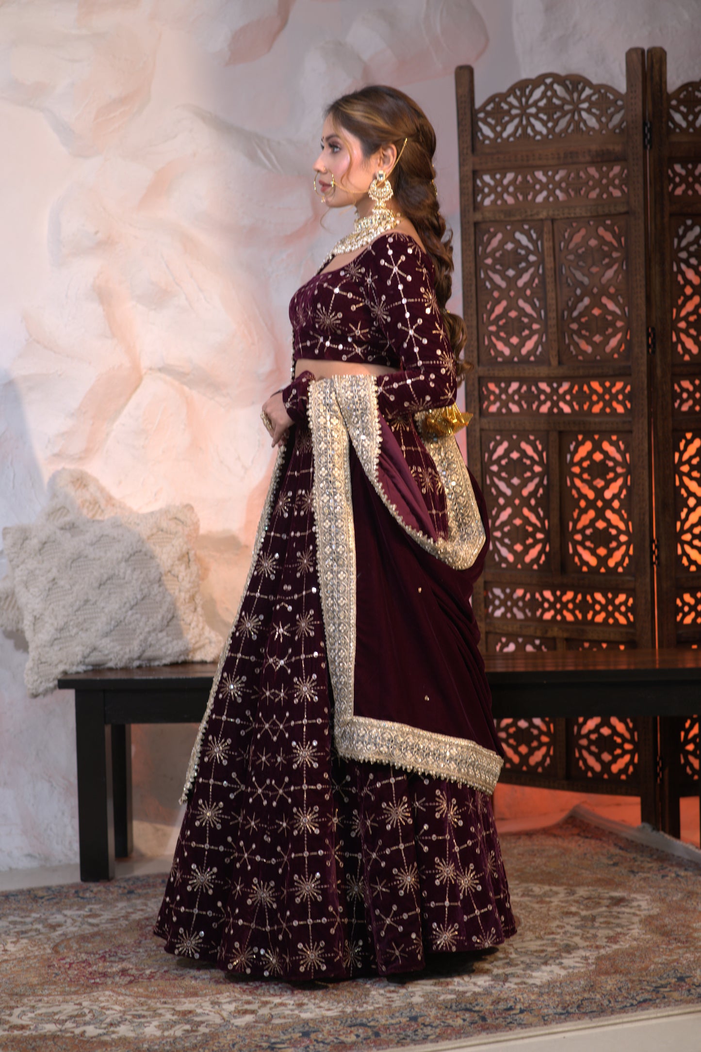 Imagine By Shiwali Geetanjali velvet lehnga in rich wine color, showcasing intricate embroidery and luxurious fabric.