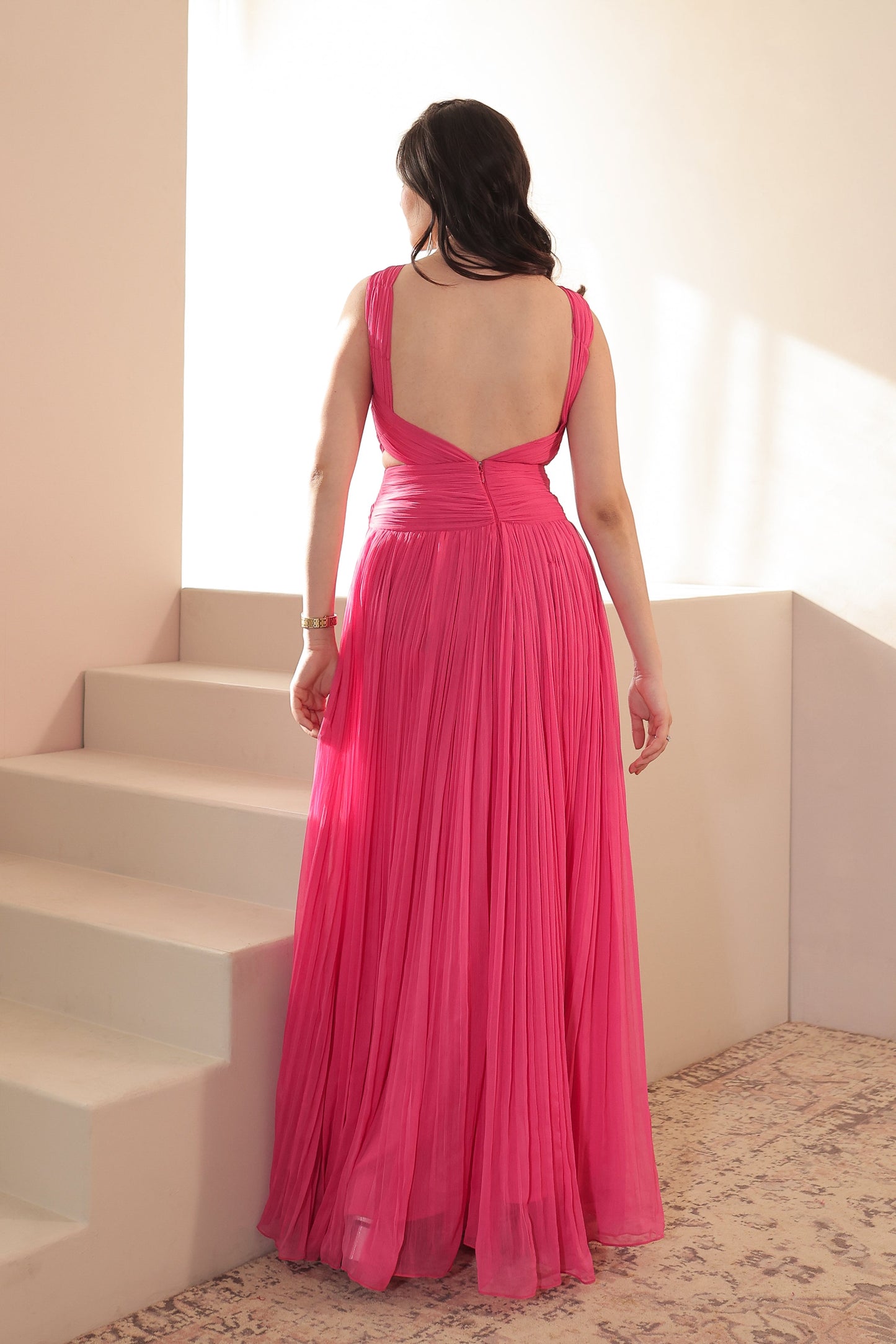Genelia pink gown by Imagine By Shiwali featuring elegant flowy fabric and intricate design details.