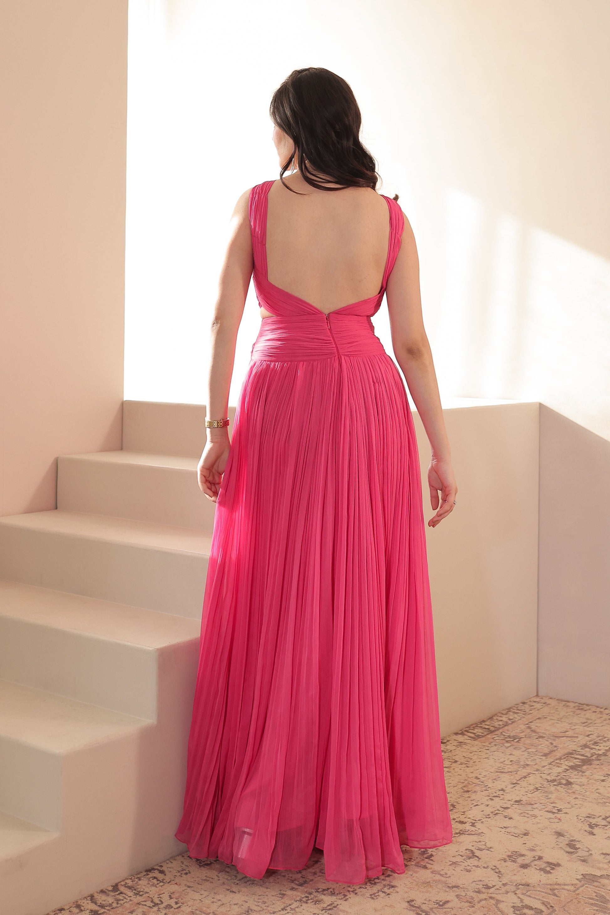 Genelia pink gown by Imagine By Shiwali featuring elegant flowy fabric and intricate design details.