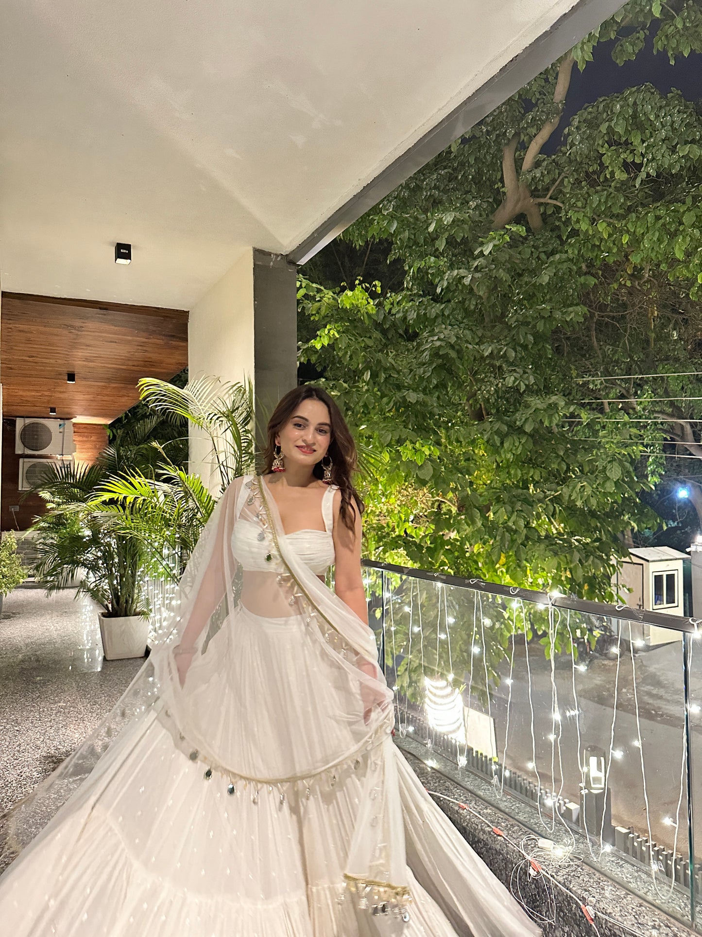 Elegant white Hans Lehnga by Imagine by Shiwali with intricate embroidery and traditional design, perfect for festive occasions.