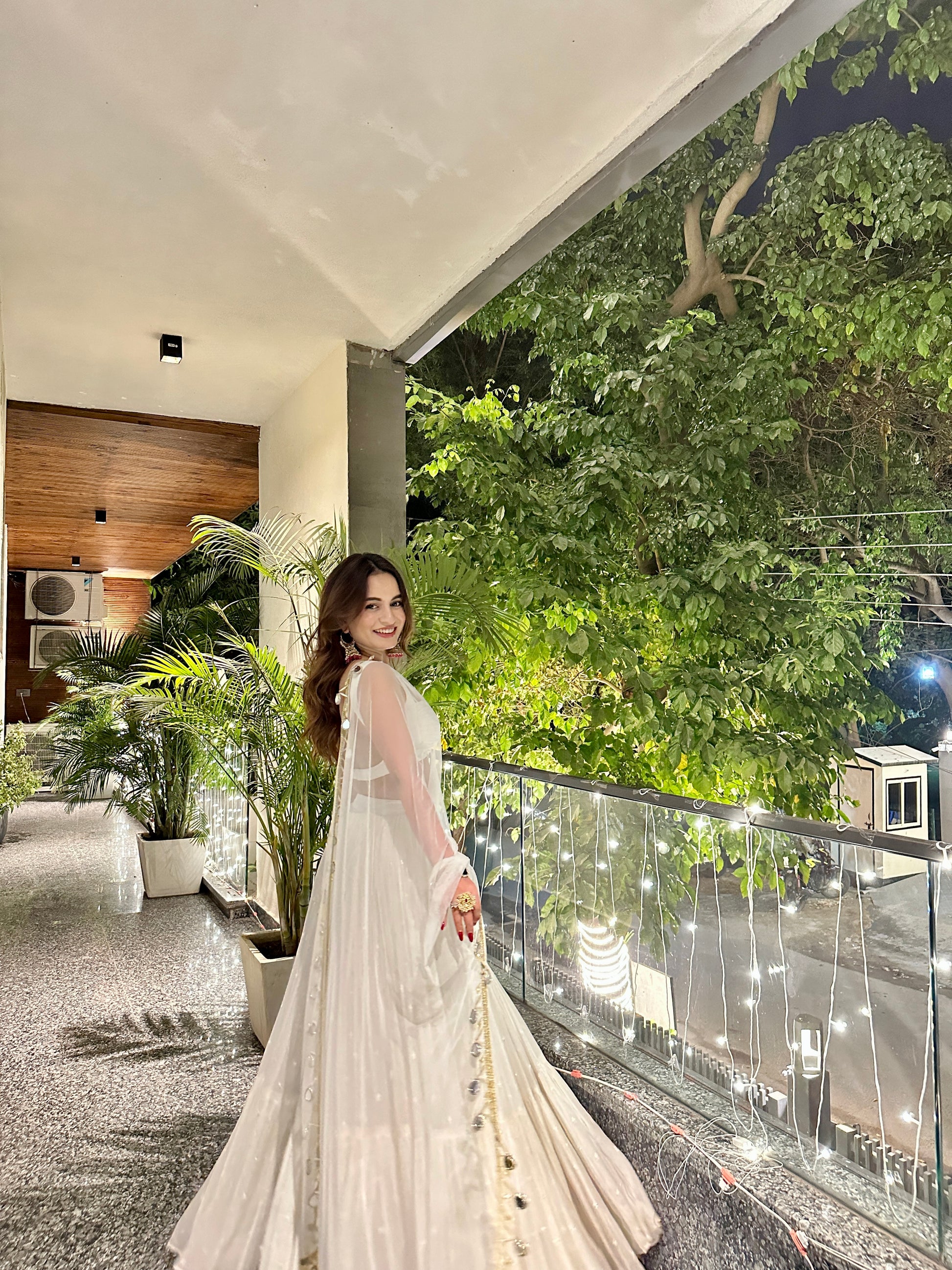 White Hans Lehnga by Imagine By Shiwali featuring intricate embroidery and traditional design, perfect for festive occasions.
