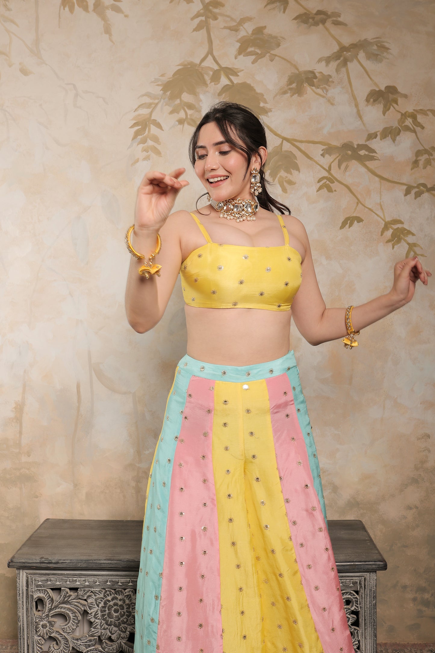 Kalki multicolour sharara set by Imagine By Shiwali featuring vibrant fabric, intricate embroidery, and traditional Indian design.