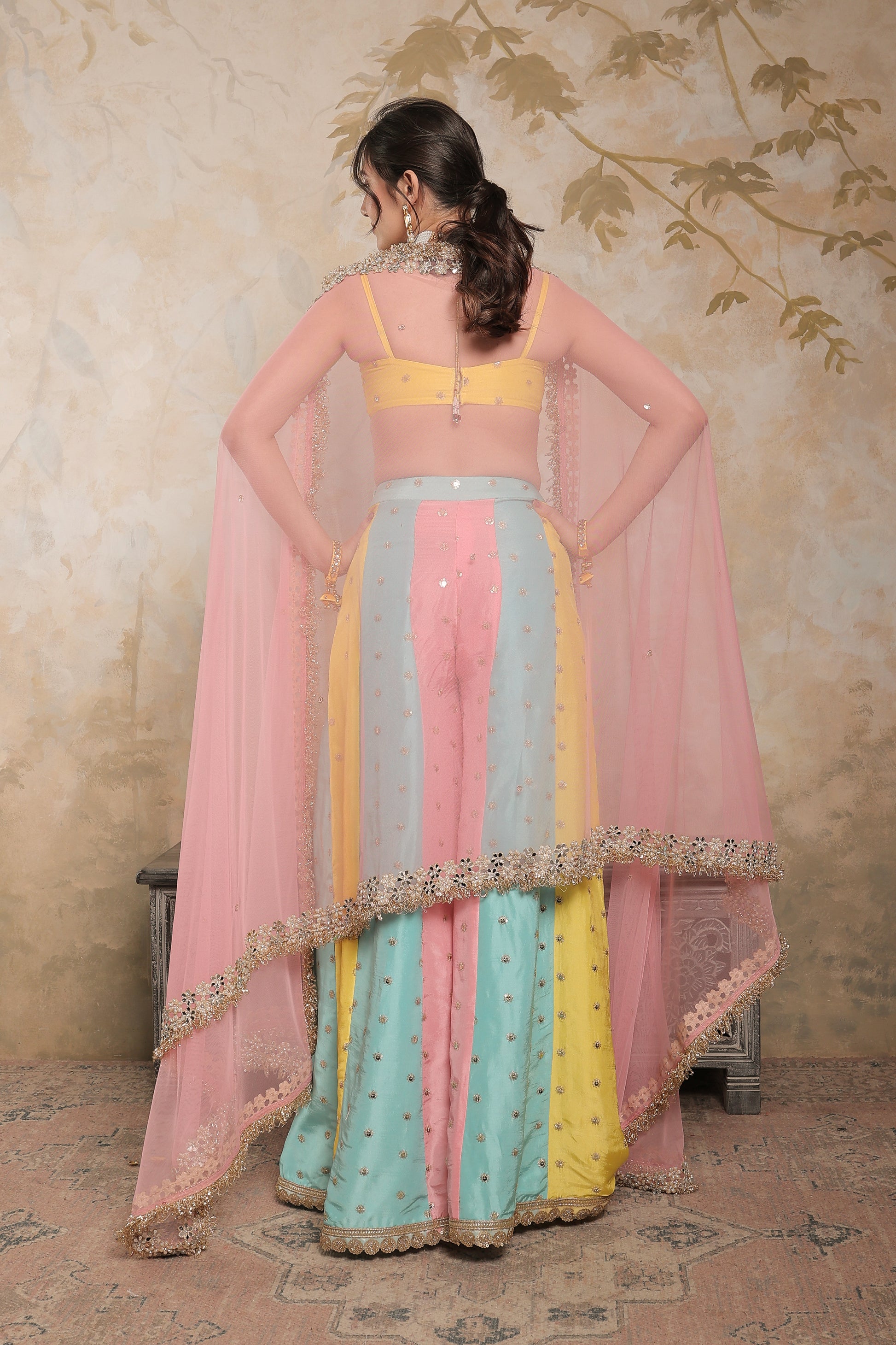 Multicolour Kalki sharara set by Imagine By Shiwali featuring vibrant fabrics and traditional design, perfect for festive occasions.