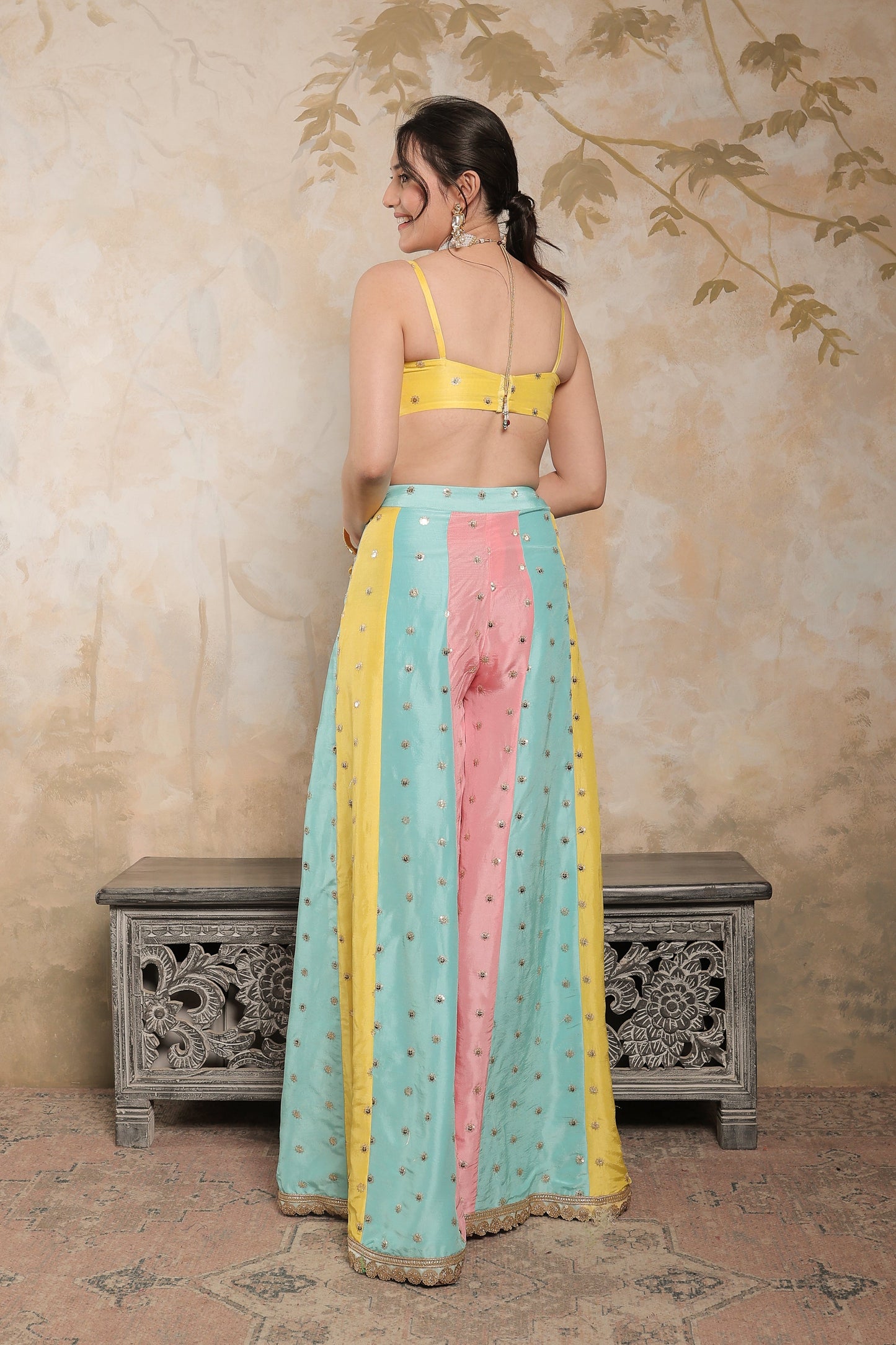 Multicolour Kalki sharara set by Imagine By Shiwali featuring vibrant patterns and traditional Indian style.
