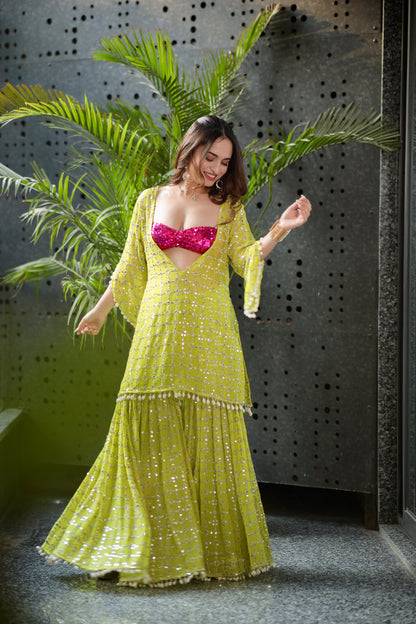 Kangana parrot green kurti and sharara set by Imagine By Shiwali, featuring intricate embroidery and traditional design.