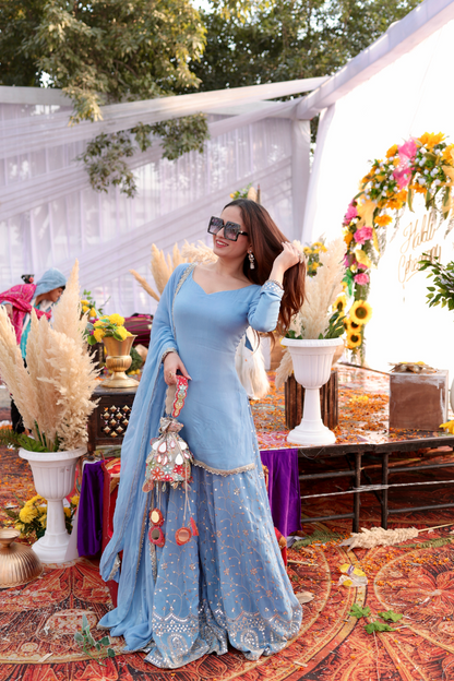 Imagine By Shiwali Kareena Gharara Suit in Ice Blue, featuring intricate embroidery and traditional design, displayed on a model.