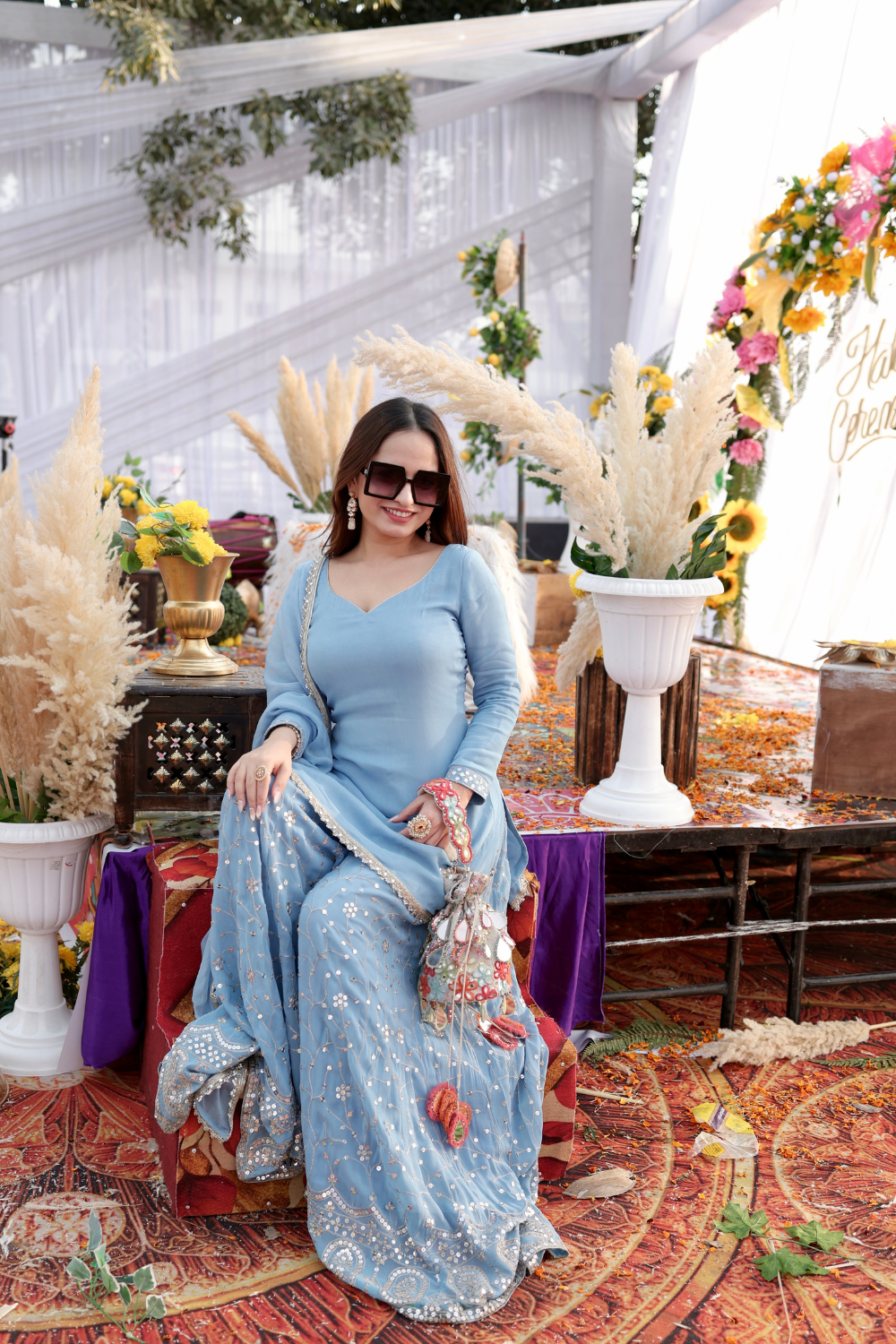 Imagine By Shiwali Kareena gharara suit in ice blue with intricate embroidery and flowing fabric, displayed on a mannequin.