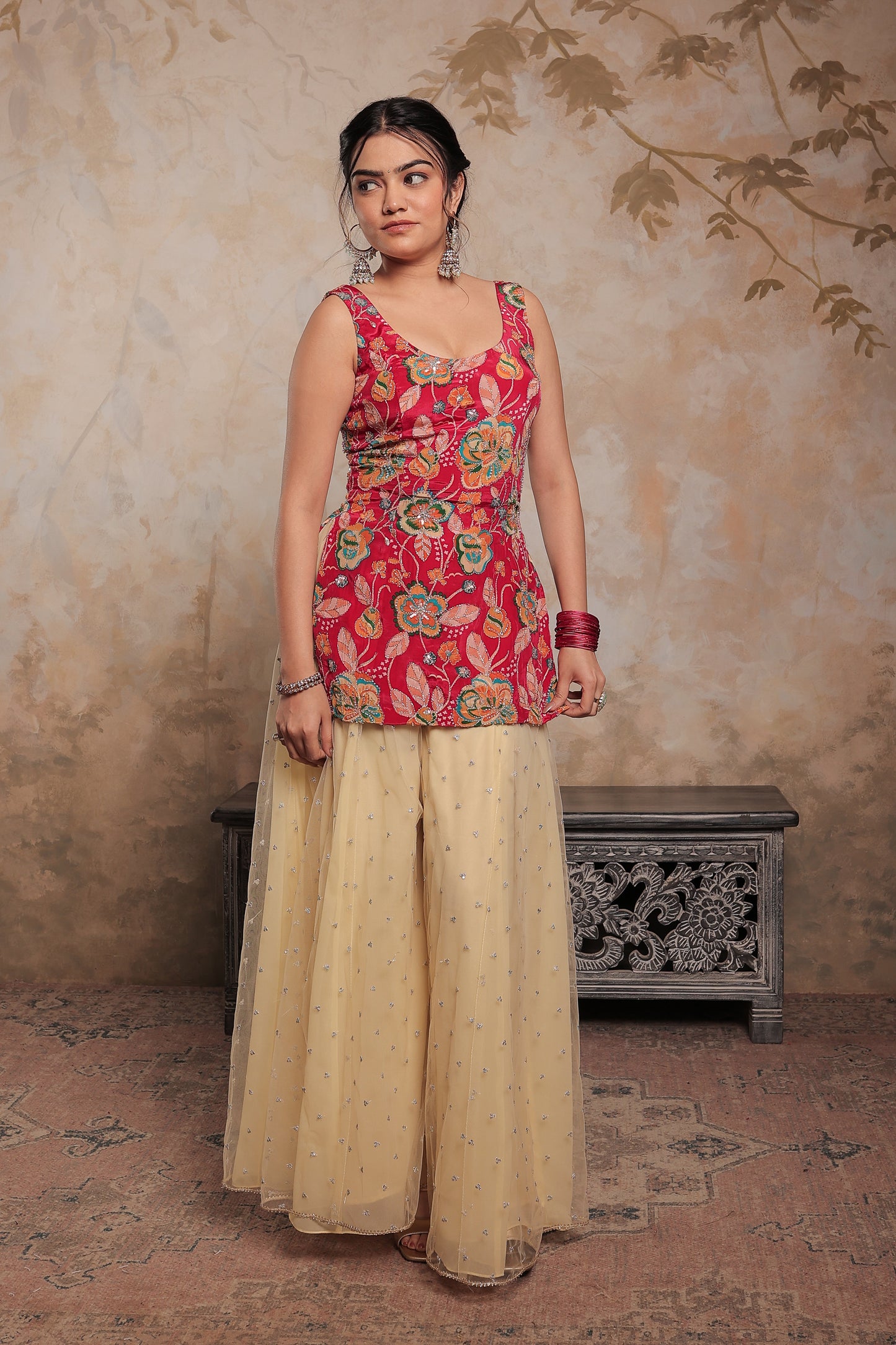 Pink and beige Karishma sharara suit by Imagine By Shiwali, featuring intricate embroidery and traditional Indian design.
