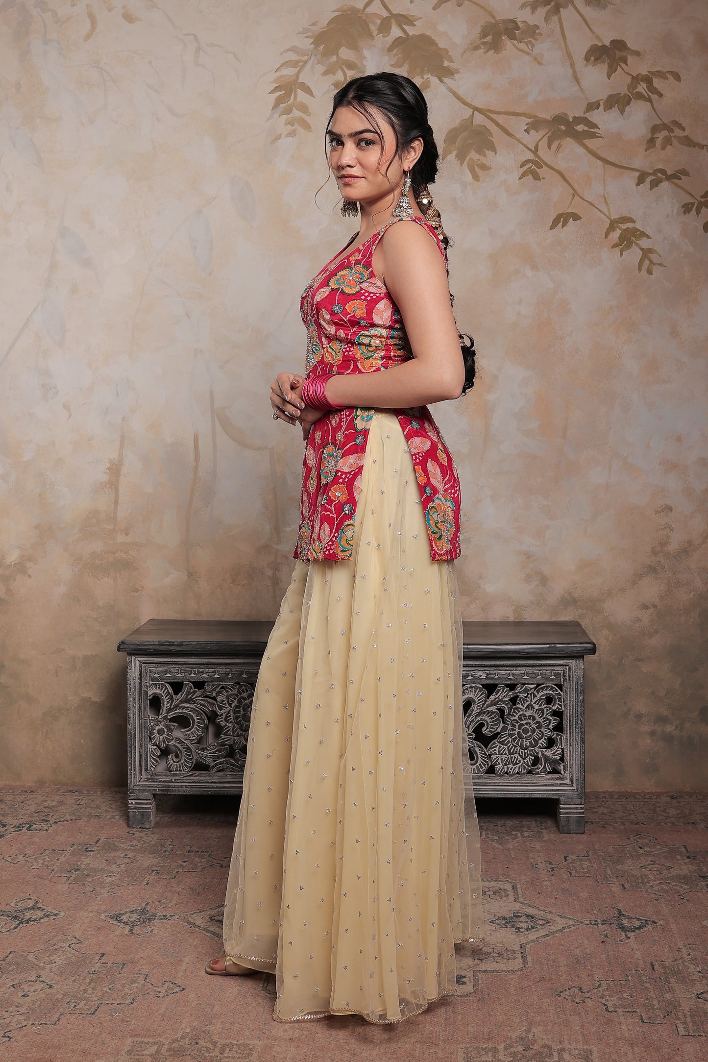 Pink and beige Karishma sharara suit by Imagine By Shiwali, featuring traditional embroidery and elegant fabric details.