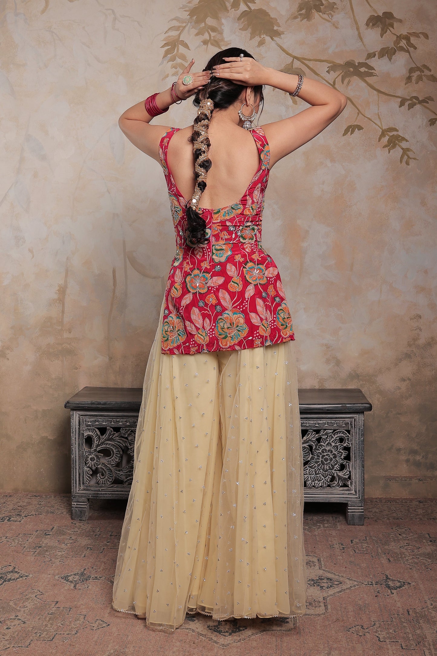 Pink and beige Karishma sharara suit by Imagine By Shiwali, featuring intricate embroidery and traditional styling.