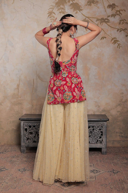 Pink and beige Karishma sharara suit by Imagine By Shiwali, featuring intricate embroidery and traditional styling.