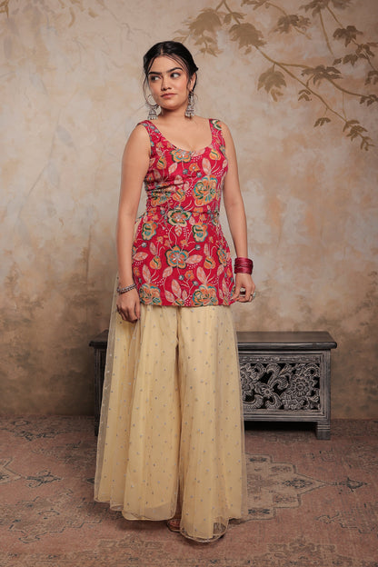 Pink and beige Karishma sharara suit by Imagine By Shiwali, featuring traditional embroidery and elegant fabric details.