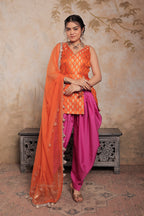 Orange and purple Kavya dhoti set by Imagine By Shiwali, featuring traditional fabric and intricate design details.