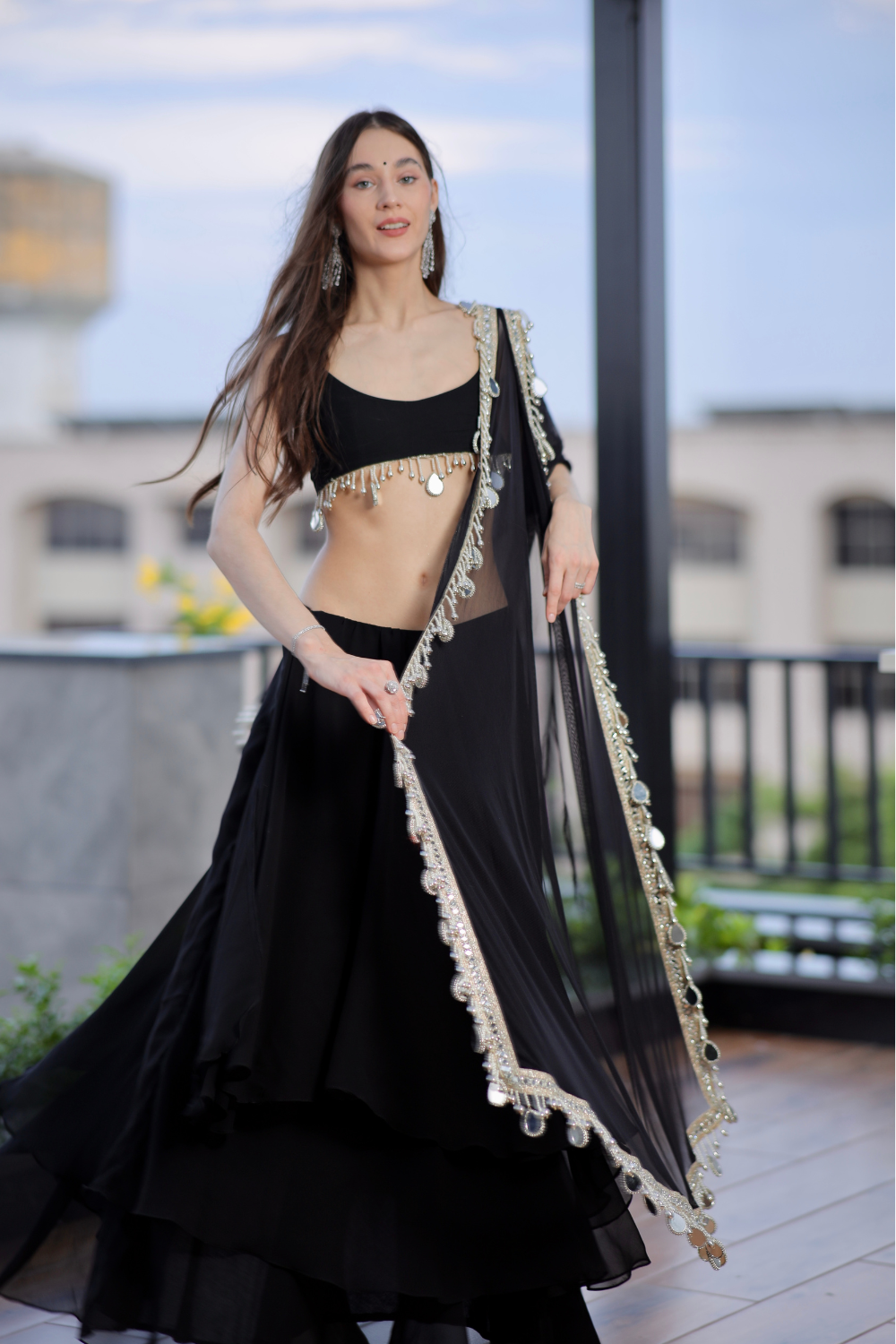 Black Kiara Lehnga by Imagine By Shiwali featuring intricate embroidery and traditional design, shown on a mannequin.