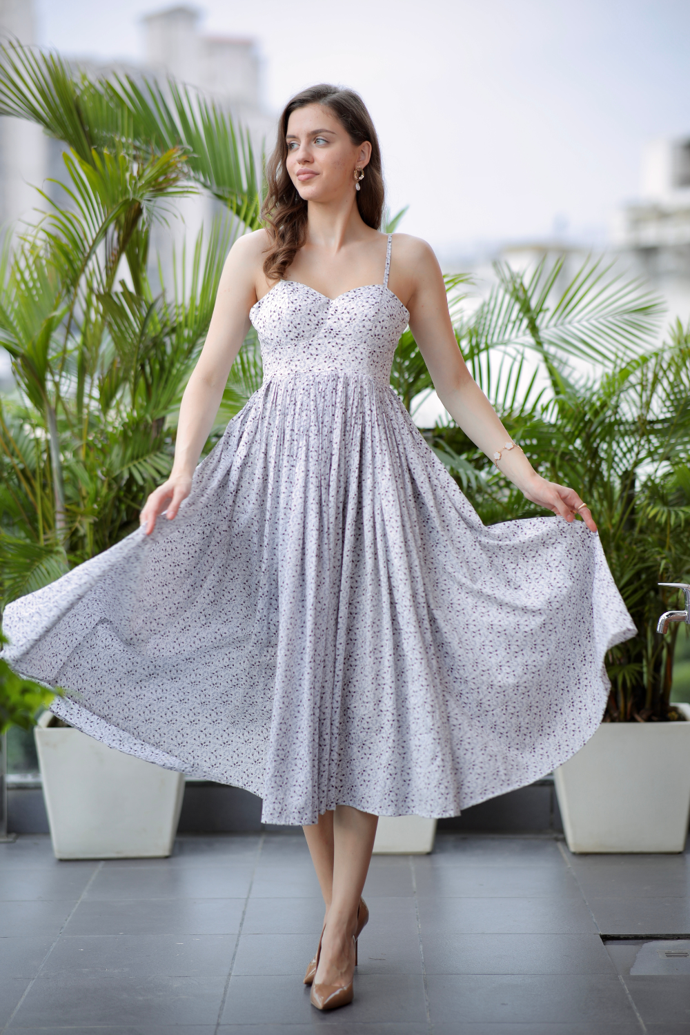 White cotton gown by Imagine By Shiwali, featuring a flowing design and delicate fabric for comfortable, elegant wear.
