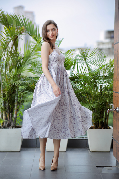 White cotton gown by Imagine By Shiwali with a relaxed fit and subtle embroidery, displayed on a wooden hanger.