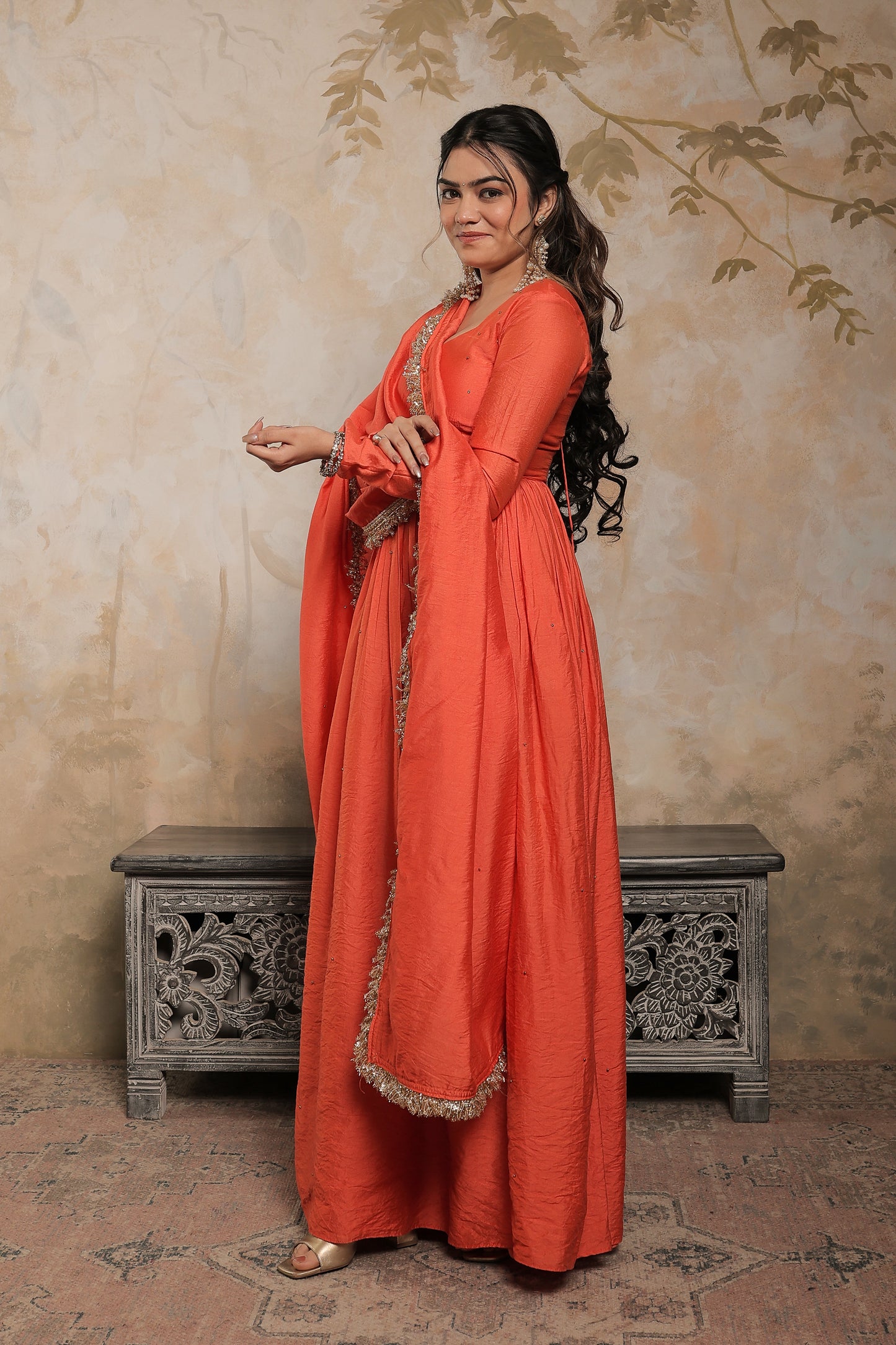 Laila orange chanderi anarkali dress by Imagine By Shiwali featuring intricate embroidery and flowing fabric.