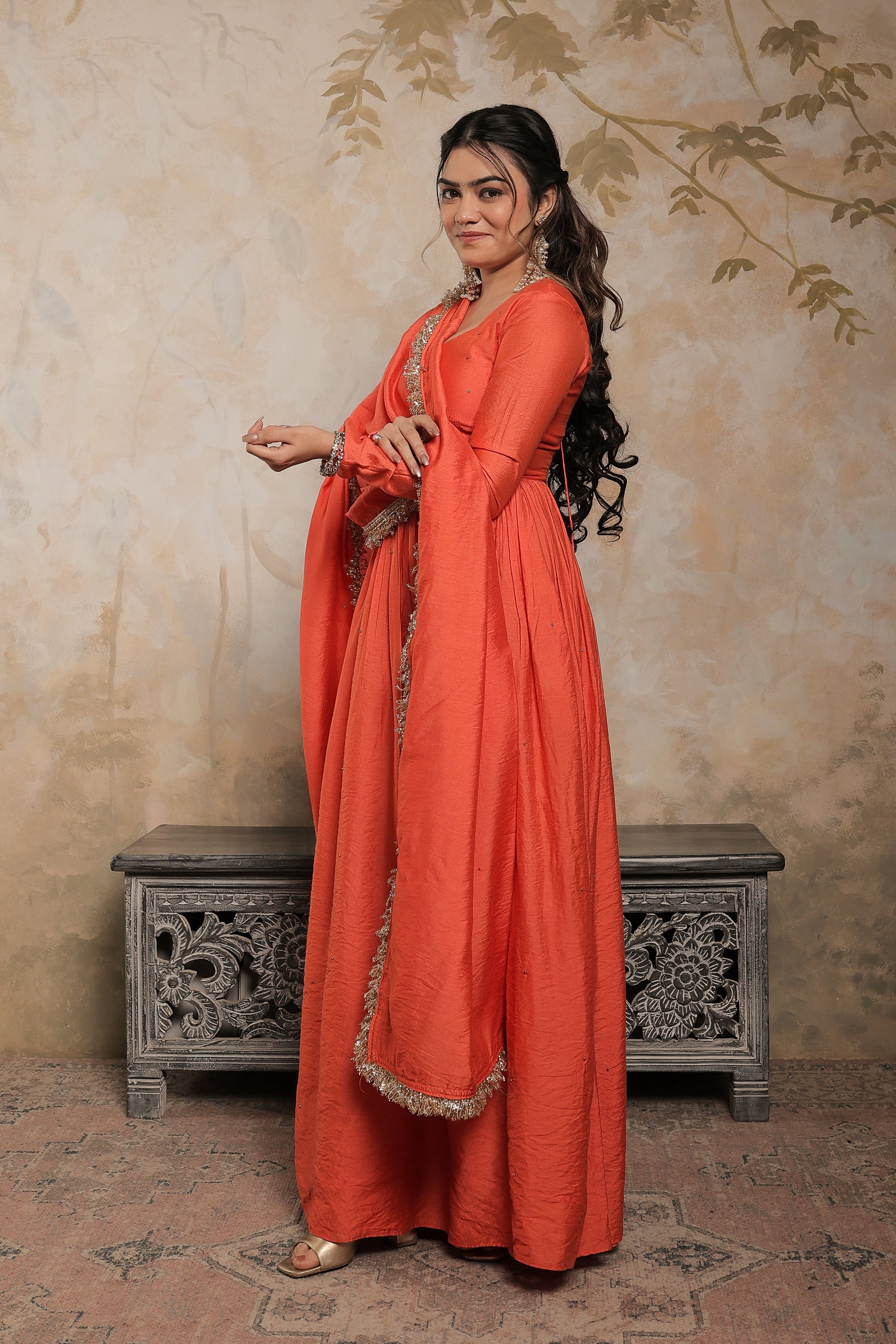 Laila orange chanderi anarkali dress by Imagine By Shiwali featuring intricate embroidery and flowing fabric.