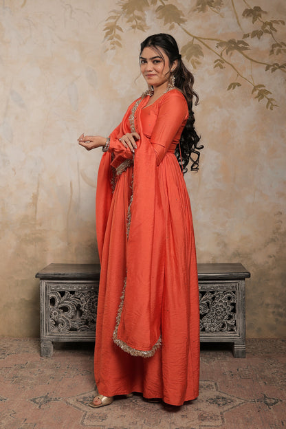 Laila orange Chanderi Anarkali dress by Imagine By Shiwali, featuring intricate embroidery and flowing fabric.