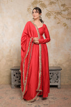 Red Laila Chanderi Anarkali dress by Imagine By Shiwali with intricate embroidery and flowing fabric, styled for festive occasions.