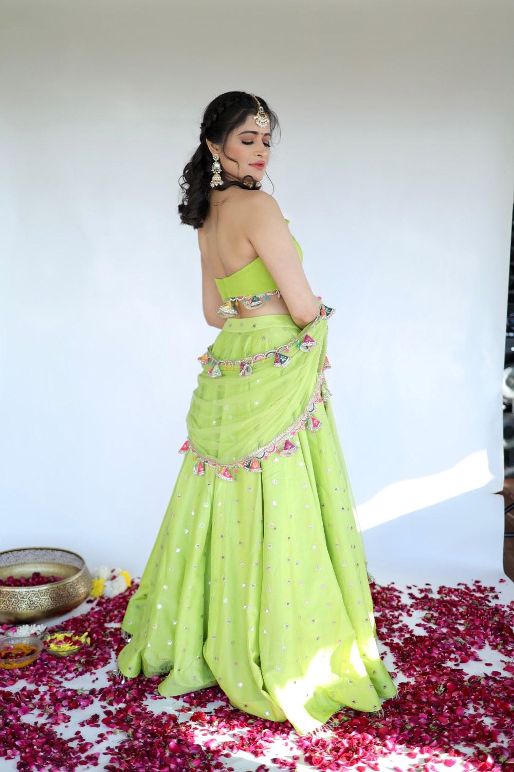 Lotus green Lehnga from Imagine By Shiwali featuring intricate embroidery and traditional design, showcased on a plain background.