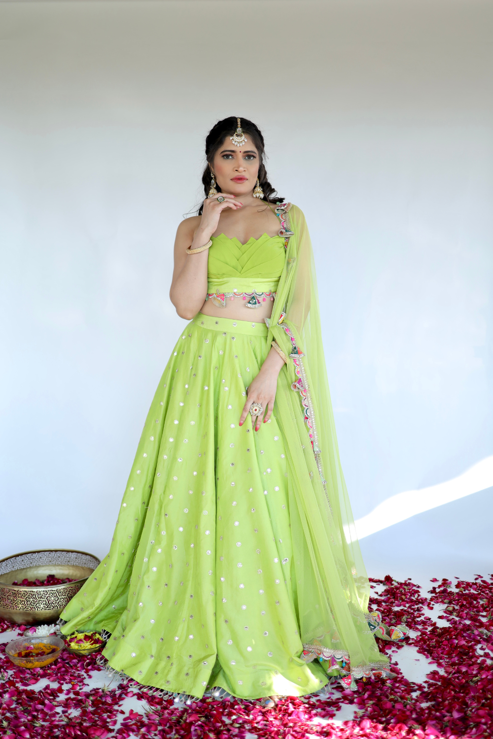 Lotus green Lehnga by Imagine By Shiwali, featuring intricate embroidery and traditional design, worn for festive occasions.