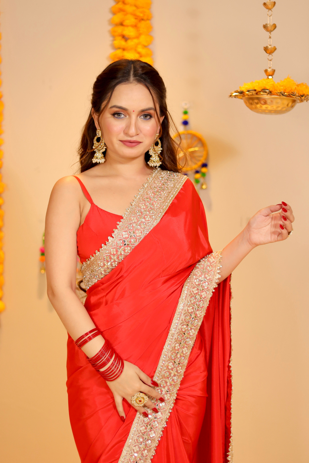 Maastani red saree with matching blouse from Imagine By Shiwali, featuring traditional fabric and elegant drape.