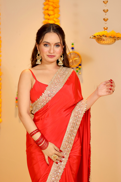 Maastani red saree with matching blouse from Imagine By Shiwali, featuring traditional fabric and elegant drape.