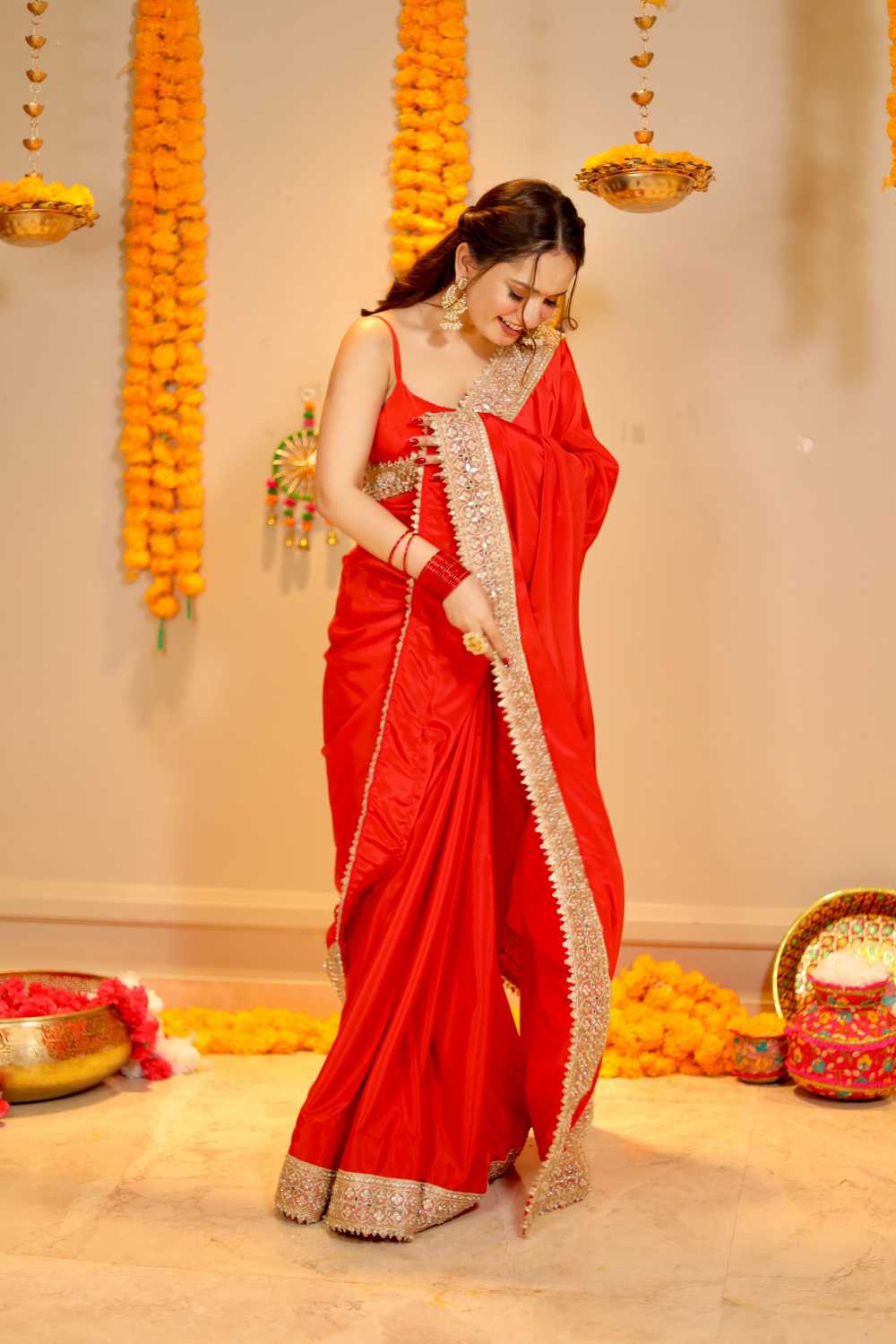 Red Maastani saree with matching blouse from Imagine By Shiwali, featuring traditional Indian design and intricate fabric details.