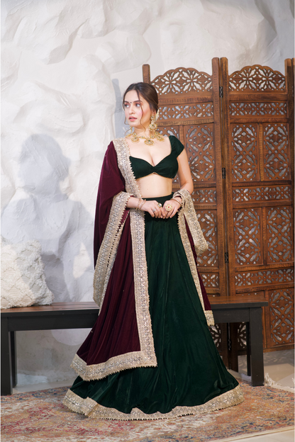 Madhu Velvet Lehnga by Imagine By Shiwali featuring rich velvet fabric and intricate embroidery in vibrant colors.