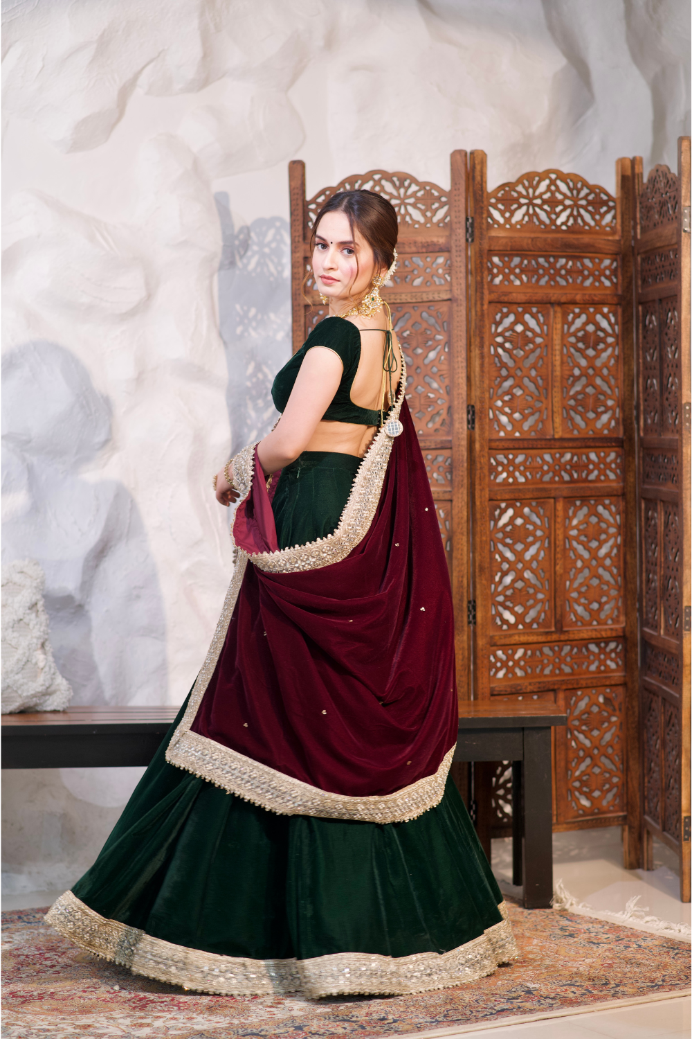 Pink Madhu Velvet Lehnga by Imagine By Shiwali featuring intricate embroidery and flowing fabric for traditional festive wear.