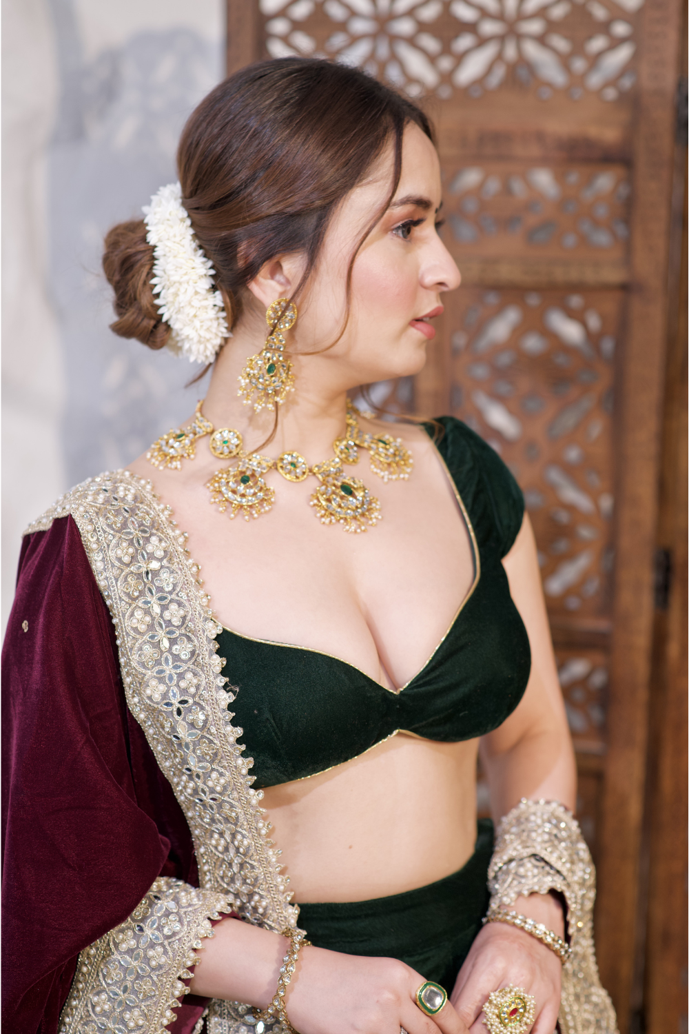 Pink Madhu Velvet Lehnga by Imagine By Shiwali featuring intricate embroidery and a flowing fabric design.