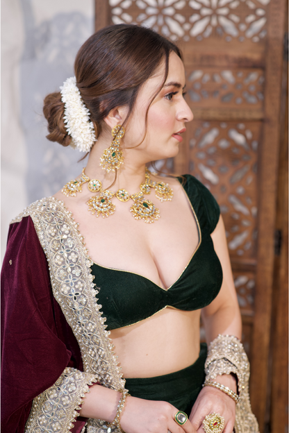 Pink Madhu Velvet Lehnga by Imagine By Shiwali featuring intricate embroidery and a flowing fabric design.
