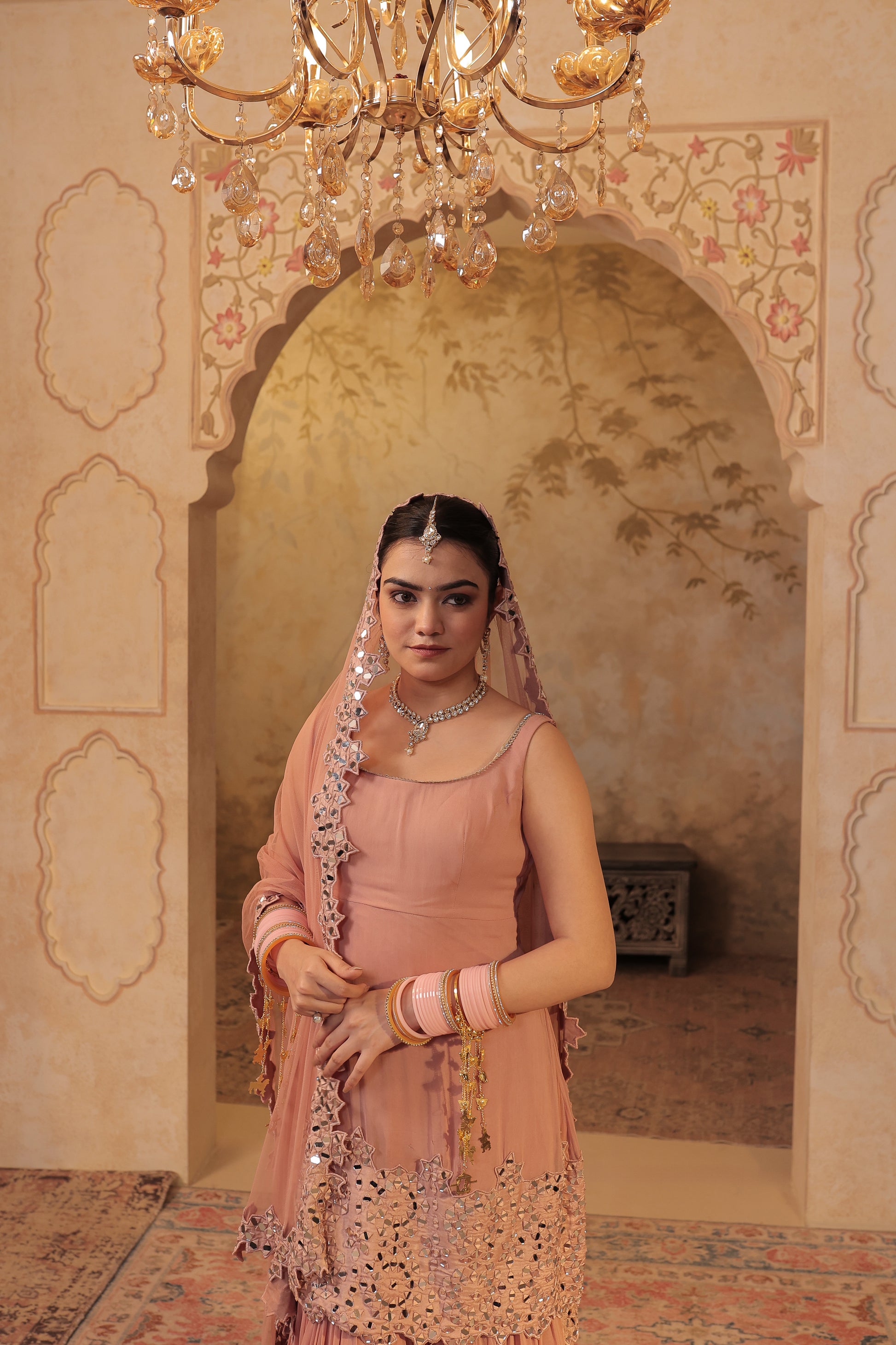 Madhubala mirrorwork sharara set by Imagine By Shiwali, featuring traditional mirror embroidery and vibrant fabric for festive wear.