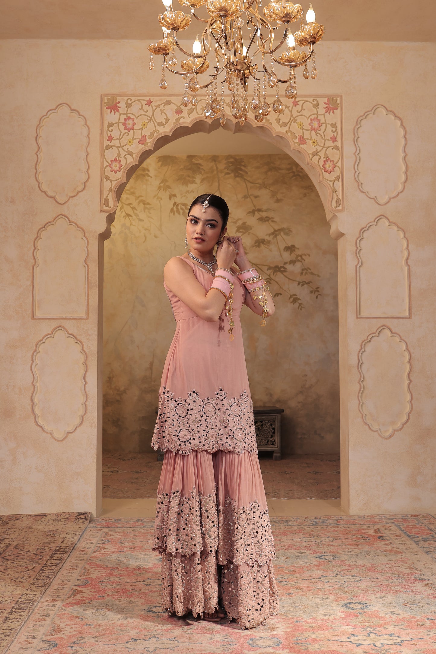 Elegant Madhubala mirrorwork sharara set by Imagine By Shiwali featuring intricate mirror embellishments and traditional design.
