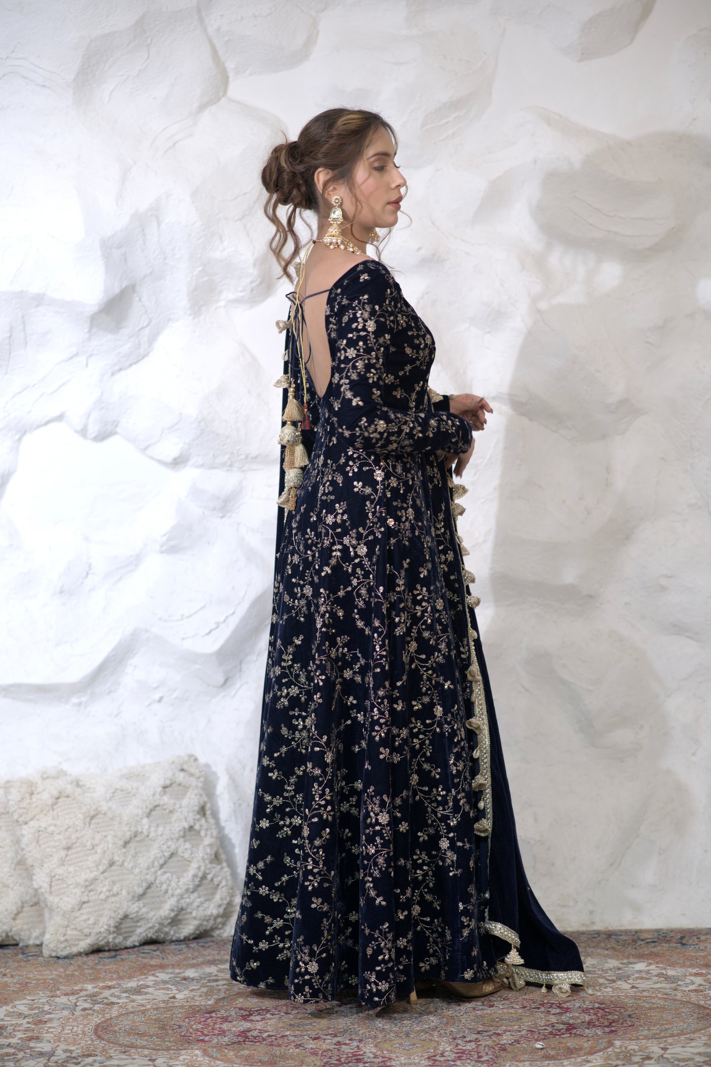Navy blue velvet Malaika Anarkali dress by Imagine By Shiwali with intricate embroidery and flowing silhouette.