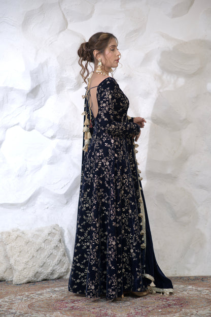 Navy blue velvet Anarkali dress from Malaika collection by Imagine By Shiwali, featuring intricate embroidery and traditional design.