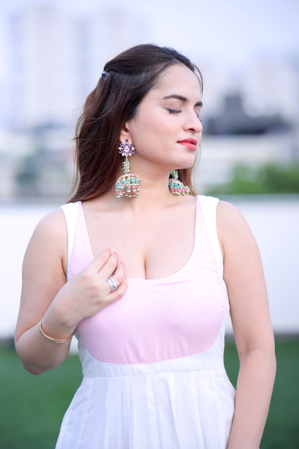 Imagine By Shiwali Meera White-Pink Anarkali dress with intricate embroidery and flowy fabric, perfect for traditional occasions.