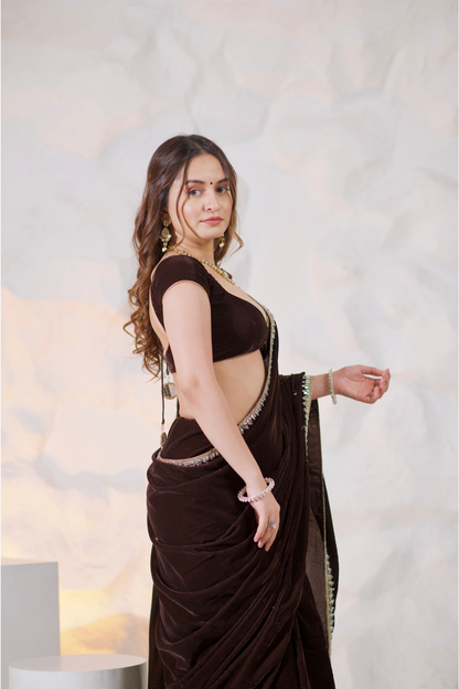 Nazia Brown Velvet Saree by Imagine By Shiwali, showcasing rich brown velvet fabric with elegant drape and intricate detailing.