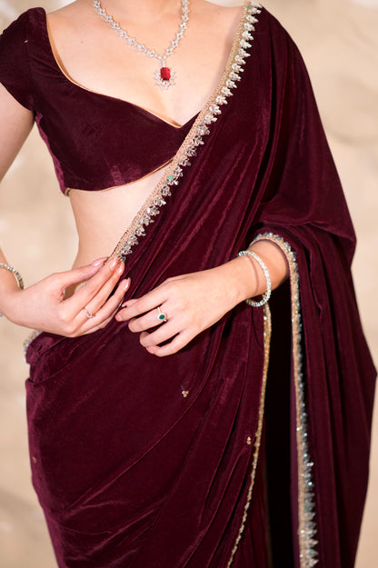 Nazia Wine Velvet Saree by Imagine By Shiwali displayed with rich wine-colored velvet fabric and elegant drape.