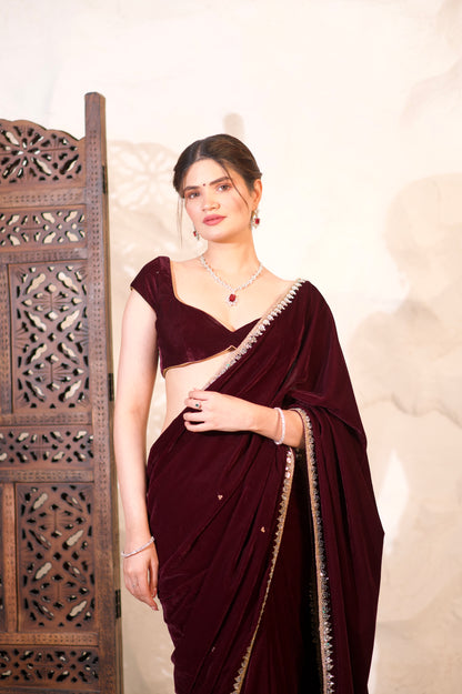 Nazia Wine Velvet Saree by Imagine By Shiwali displayed with rich wine-colored velvet fabric and intricate design details.